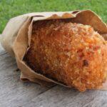 Luscious meat and cheese stuffed rice balls