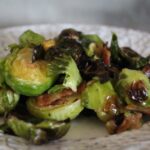 Roast brussels sprouts with crispy bacon and toasted pistachios