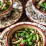 Pioppino mushroom soup with spring peas, pancetta and green onions; make in just 20 minutes!