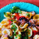 Spicy baby calamari with orecchiette is one of the tastiest pasta dishes, and start to finish it takes twenty minutes to make!