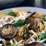 Penne summer pasta with eggplant is a luscious Sicilian dish. Fresh basil and salted ricotta add additional great flavor to the dish!