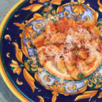 Gnocchi on serving plate