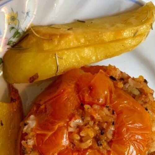 Baked tomatoes stuffed with rice and herbs at Pizza House
