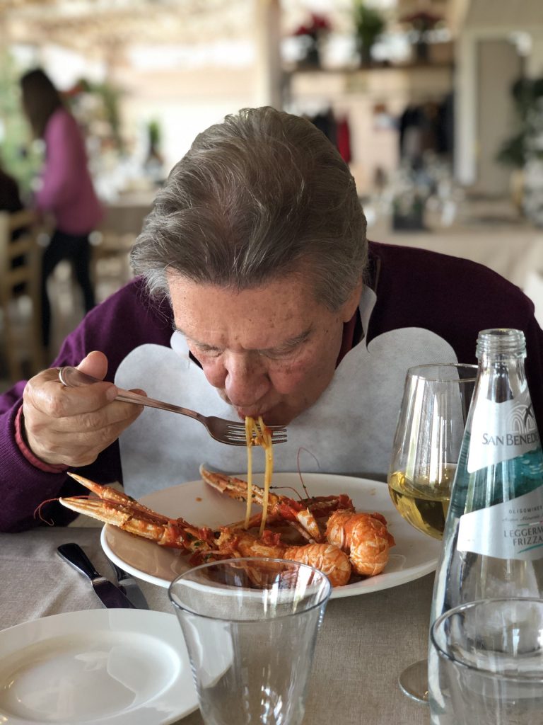  My husband enjoying the luscious seafood in Polignano a Mare