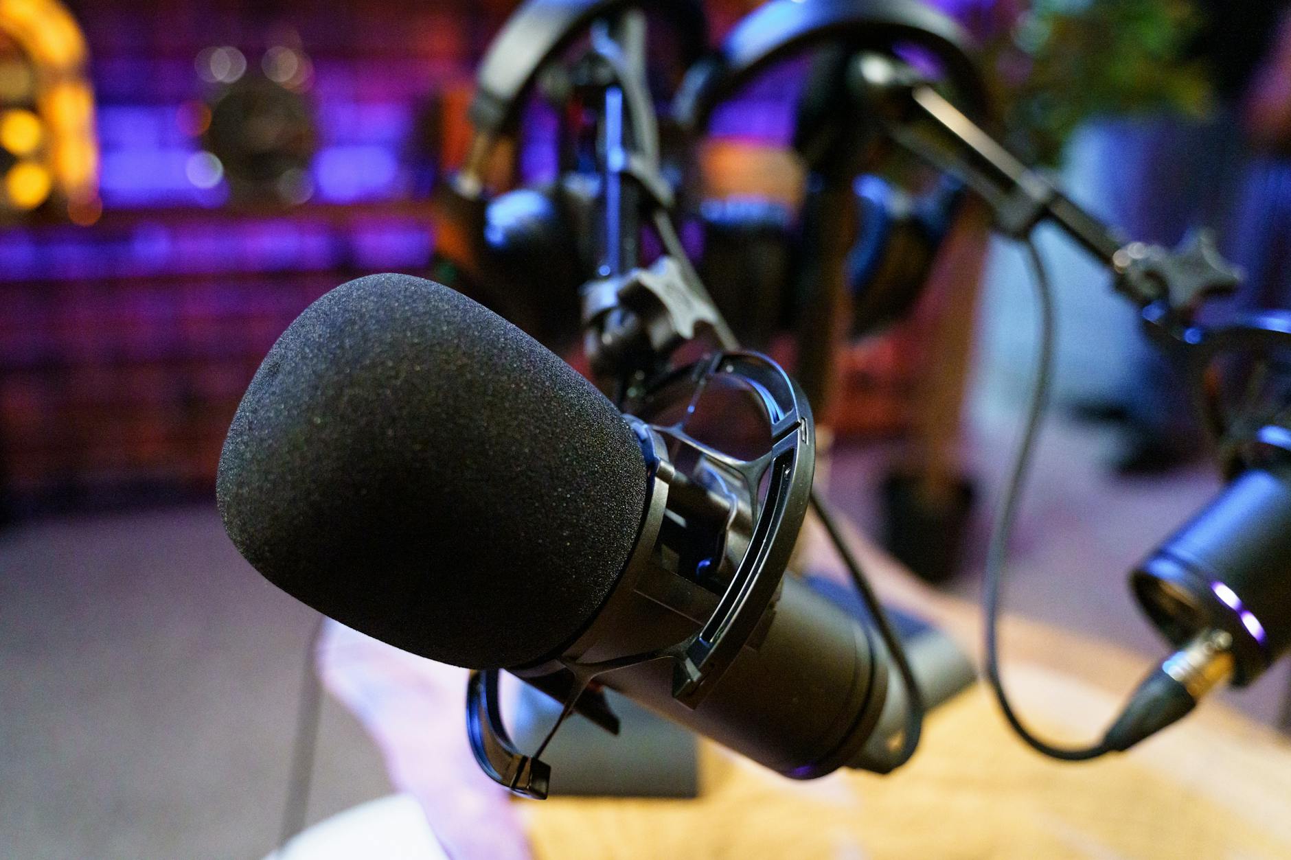 a close up shot of a condenser microphone flavor of Italy podcast
