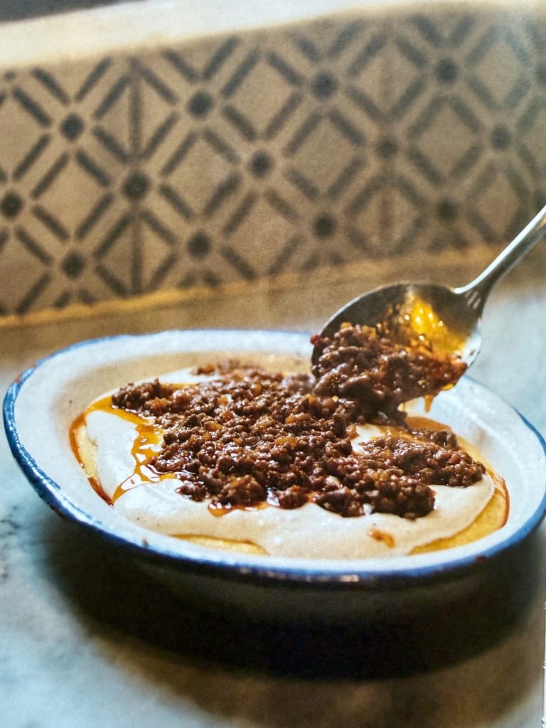 polenta topped with béchamel and rich ragù